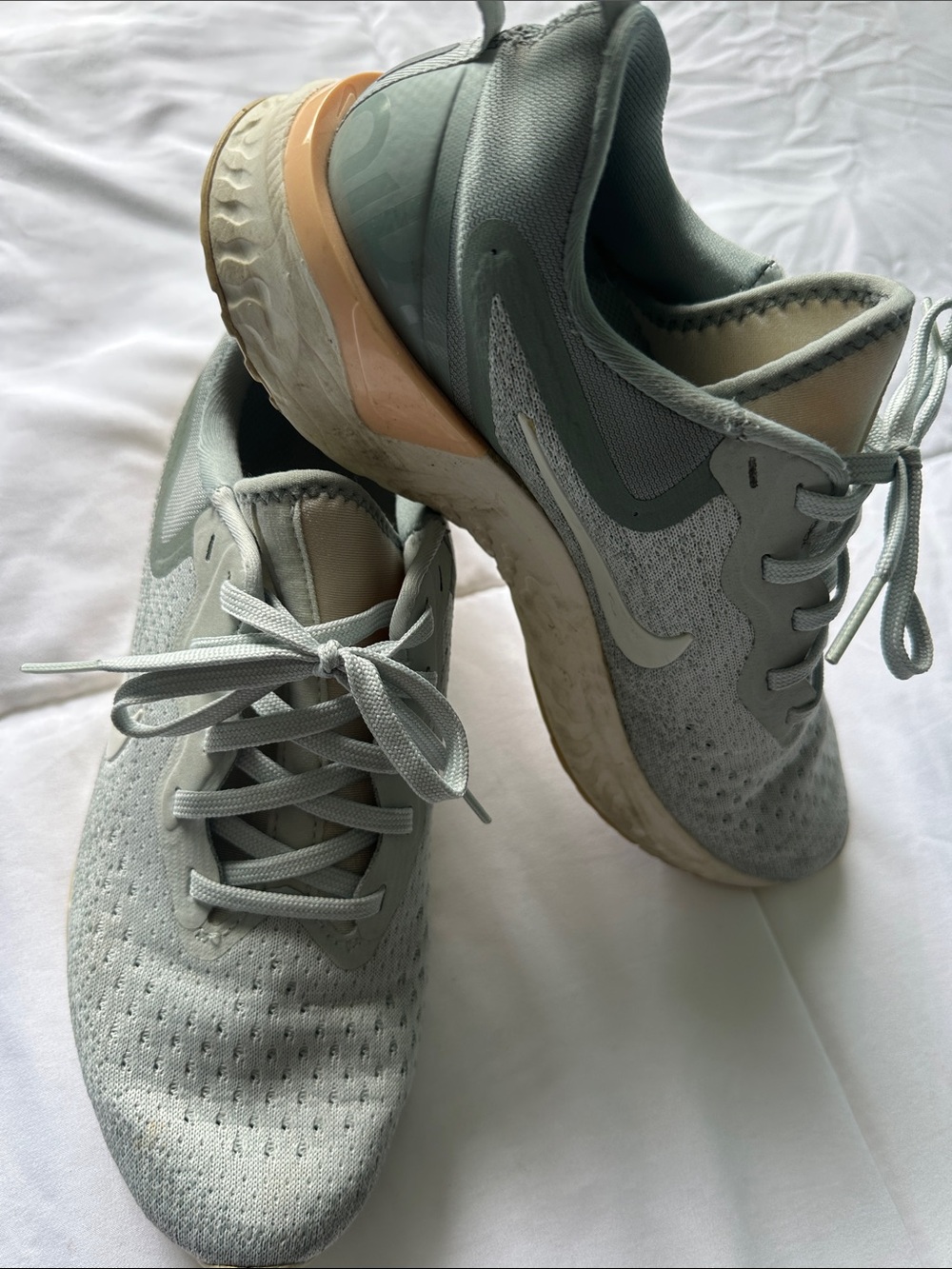 Nike Women's Mint Green Running Shoes with Peach Heel Accent